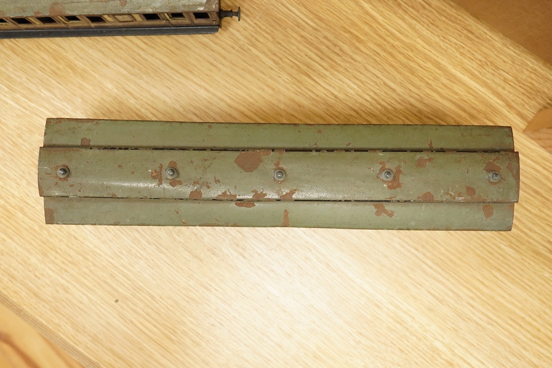 Three Carette for Bassett-Lowke 0 gauge tinplate GWR clerestory bogie coaches; two First Third Composite coaches, both 1324, and a full brake van, 1334, all in chocolate and cream livery